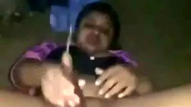 Nude desi lady fucks her hairy pussy with a brinjal