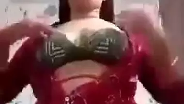 Sexy girl shows her boobs and ass to striptease her BF