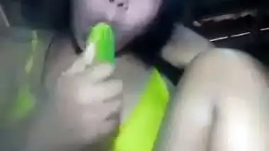 Naked Assamese girl fucks her pussy with a cucumber