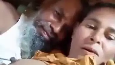 An old man enjoys the boob sucking of a desi lady