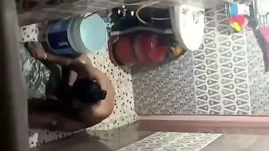 Neighbor aunty taking bath caught by voyeur